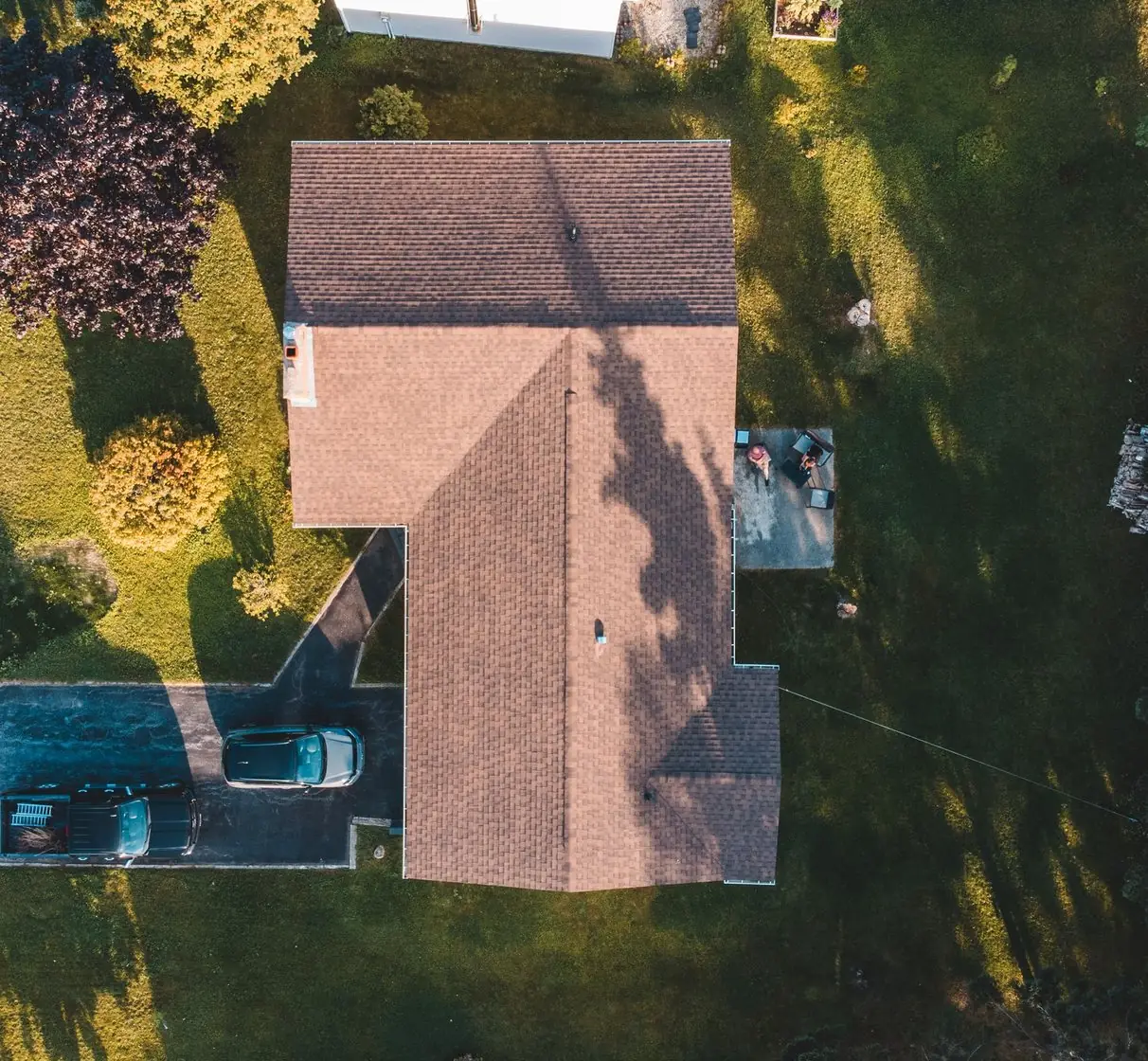 A house roof photographed straight down, the whole outline visible